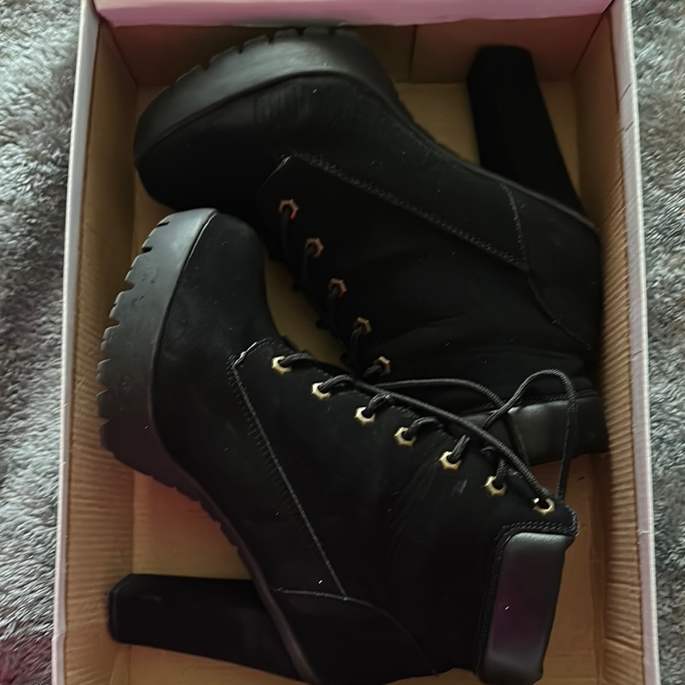Black Heeled Boots with Lace-Up Design